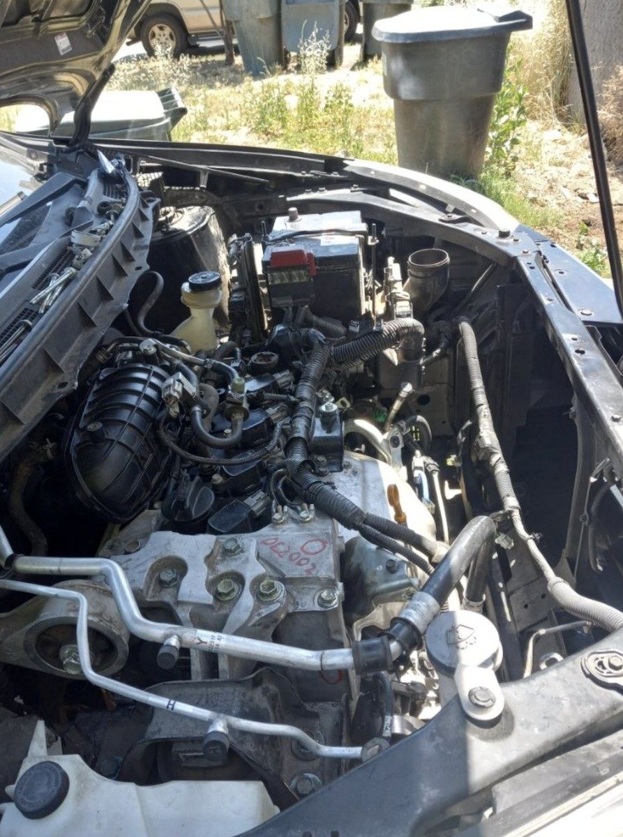 Battery and charging inspection under an Atlanta hood